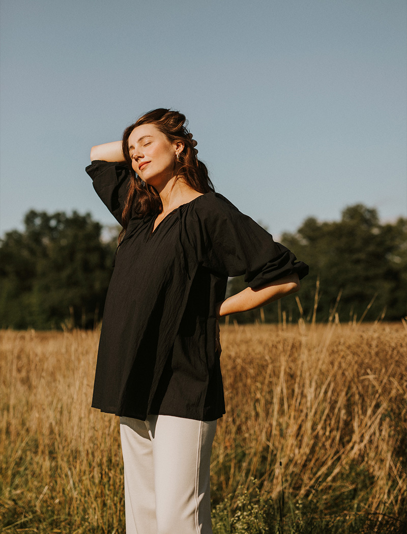 Signe wearing pregnancy top and maternity pants